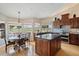 Bright kitchen featuring granite counters, stainless steel appliances and eat in breakfast nook with great views at 8542 W Rosemonte Dr, Peoria, AZ 85382