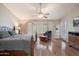Spacious main bedroom features a cozy sitting area and an ensuite bathroom at 8542 W Rosemonte Dr, Peoria, AZ 85382