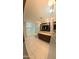 Bathroom with a walk-in shower, tile floors, a granite-top vanity, and a framed mirror at 921 S Val Vista Dr # 28, Mesa, AZ 85204