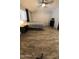 Bedroom with wood-look floors, ceiling fan, and a window at 921 S Val Vista Dr # 28, Mesa, AZ 85204