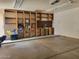 Spacious garage with built-in shelving, offering ample storage and organization at 921 S Val Vista Dr # 28, Mesa, AZ 85204