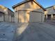 Charming home with a detached garage, ample driveway space, and a private gated entrance at 921 S Val Vista Dr # 28, Mesa, AZ 85204