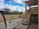 Outdoor patio features a staircase leading to the upper level and AC Unit at 921 S Val Vista Dr # 28, Mesa, AZ 85204