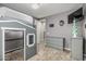 Bedroom features a ladder bed with a play area, a dresser, and neutral-toned walls at 11511 E Chestnut Ct, Chandler, AZ 85249