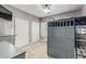 Modern bedroom with gray walls, a gray ladder bed, and ample closet space at 11511 E Chestnut Ct, Chandler, AZ 85249