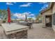 Outdoor kitchen boasts a built-in grill, perfect for backyard barbecues and hosting guests at 11511 E Chestnut Ct, Chandler, AZ 85249