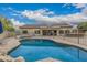 Inviting backyard pool and spa with unobstructed views of the home and private outdoor spaces at 11511 E Chestnut Ct, Chandler, AZ 85249