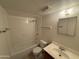 Simple bathroom with a combined shower and tub, standard fixtures, and a vanity at 12231 N 22Nd Ave, Phoenix, AZ 85029