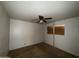 A modest bedroom with damaged walls and a boarded window, awaiting renovation at 12231 N 22Nd Ave, Phoenix, AZ 85029