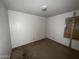 Compact bedroom with simple features and a boarded window, ready for a refresh at 12231 N 22Nd Ave, Phoenix, AZ 85029