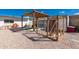 Backyard featuring a chicken coop, landscaping, and wooden pergola at 14616 N 28Th Pl, Phoenix, AZ 85032