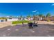 Wide backyard featuring artificial turf, patio, pergola and landscaping with rock surface at 14616 N 28Th Pl, Phoenix, AZ 85032