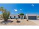 Charming single-story home featuring xeriscape landscaping and a welcoming front entrance at 14616 N 28Th Pl, Phoenix, AZ 85032