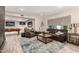 Comfortable living room with a fireplace, plush seating, and a pool table for entertaining guests at 14616 N 28Th Pl, Phoenix, AZ 85032
