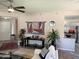 Bright living area flows into kitchen with breakfast bar, ideal for entertaining at 15252 N 100 St # 1146, Scottsdale, AZ 85260