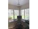 Corner office space featuring a granite desktop, modern lighting, and views of the surrounding yard at 15252 N 100 St # 1146, Scottsdale, AZ 85260