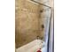 Well-appointed shower with decorative tile accents and modern showerhead fixture at 15252 N 100 St # 1146, Scottsdale, AZ 85260