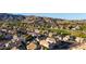Aerial view of a beautiful neighborhood with well-maintained homes and lush green landscaping at 16014 S 13Th Way, Phoenix, AZ 85048