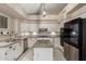 Bright kitchen with granite counters, island, and stainless steel appliances at 16014 S 13Th Way, Phoenix, AZ 85048
