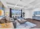 Inviting living area with coffered ceilings, neutral walls, and tile flooring at 16322 N 171St Dr, Surprise, AZ 85388