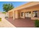 Covered back patio includes ceiling fan and provides transition to indoor and outdoor living spaces at 1700 E Lakeside Dr # 64, Gilbert, AZ 85234