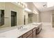Bright bathroom featuring double sinks, lots of counter space and a garden tub and shower at 1700 E Lakeside Dr # 64, Gilbert, AZ 85234
