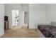 Inviting bedroom with a twin bed and attached bathroom and plenty of natural light at 17219 W Gibson Ln, Goodyear, AZ 85338