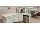 Modern kitchen featuring an island with stainless steel appliances, and an open-concept floor plan at 17219 W Gibson Ln, Goodyear, AZ 85338