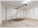 Spacious two-car garage with automatic door offers ample parking at 17279 W Dartmouth St, Surprise, AZ 85388