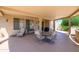Expansive covered patio provides ample room for relaxation, dining, and entertaining outdoors at 17371 N Natura Trl, Surprise, AZ 85374