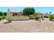 Cozy single-story home featuring mature desert landscaping, offering both beauty and minimal maintenance at 17371 N Natura Trl, Surprise, AZ 85374