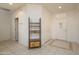 Bright and airy foyer with tile flooring, offering a grand entrance into this well-maintained home at 17371 N Natura Trl, Surprise, AZ 85374
