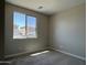 Cozy bedroom filled with natural light and neutral tones, ready for relaxation at 17482 W Fulton St, Goodyear, AZ 85338