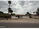 Charming single-story home with a well-maintained exterior and desert landscaping at 1807 W Hazelwood St, Phoenix, AZ 85015