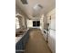 Functional kitchen with ample storage, classic appliances, and bright natural light at 1807 W Hazelwood St, Phoenix, AZ 85015