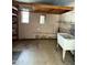 This is a view of the laundry room with a utility sink at 1807 W Hazelwood St, Phoenix, AZ 85015