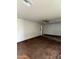 Spacious living room with carpet and ceiling fan, ready for personal touches at 1807 W Hazelwood St, Phoenix, AZ 85015