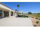 Expansive back patio offering stunning golf course views and ample space for outdoor living at 19541 N Rim Dr, Surprise, AZ 85374