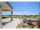 Back patio overlooking the golf course, perfect for outdoor dining and lounging with scenic views at 19541 N Rim Dr, Surprise, AZ 85374