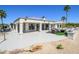 Expansive backyard patio boasts ample seating and stunning views, ideal for entertaining and enjoying the outdoors at 19541 N Rim Dr, Surprise, AZ 85374