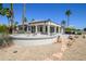 Spacious backyard showcasing elegant design elements and lush landscaping, creating an inviting outdoor oasis for relaxation at 19541 N Rim Dr, Surprise, AZ 85374
