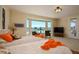 Sunny bedroom features two beds and a large window with beautiful views at 19541 N Rim Dr, Surprise, AZ 85374