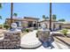 Beautiful home with lush landscaping, a private entrance, and well-maintained curb appeal at 19541 N Rim Dr, Surprise, AZ 85374