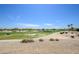 Scenic golf course view showcasing lush green fairways and blue skies perfect for outdoor recreation and relaxation at 19541 N Rim Dr, Surprise, AZ 85374