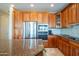 Kitchen with stainless steel appliances and granite countertops at 19541 N Rim Dr, Surprise, AZ 85374