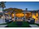 Inviting patio featuring comfortable seating around a fire pit, perfect for outdoor relaxation at 19541 N Rim Dr, Surprise, AZ 85374
