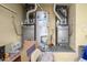 Mechanical room containing two Lennox HVACs and a hot water heater at 19541 N Rim Dr, Surprise, AZ 85374