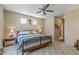 Cozy main bedroom with carpet, neutral paint and decorative decor at 20307 N Painted Sky Dr, Surprise, AZ 85374