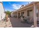 Well-lit patio features a dining area and multiple seating options, perfect for entertaining guests at 20307 N Painted Sky Dr, Surprise, AZ 85374