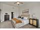 Comfortable bedroom with plush carpet, a ceiling fan, and a neutral color scheme for a calming atmosphere at 2315 N 52Nd St # 102, Phoenix, AZ 85008